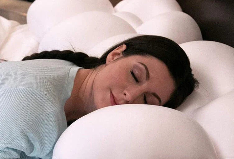 Ergonomic butterfly-shaped memory foam pillow with soft, breathable fabric cover for comfortable side-sleeping