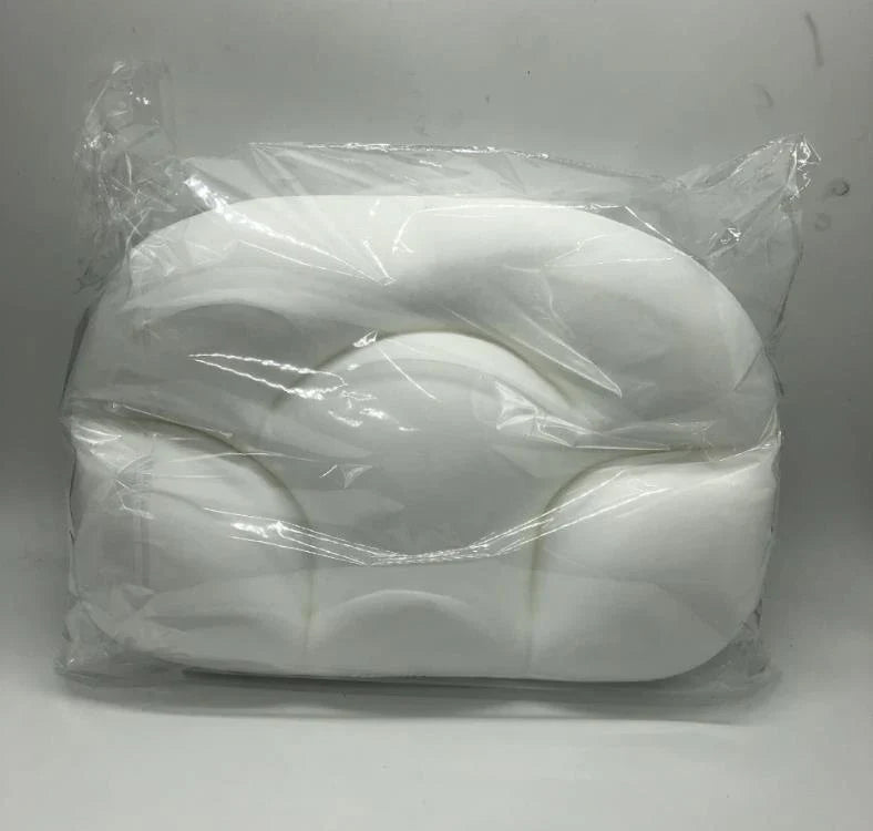 Ergonomic butterfly-shaped memory foam pillow with soft, breathable fabric cover for comfortable side-sleeping