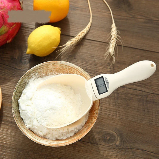 Precision digital kitchen scale with beige color, measuring ingredients for baking and cooking