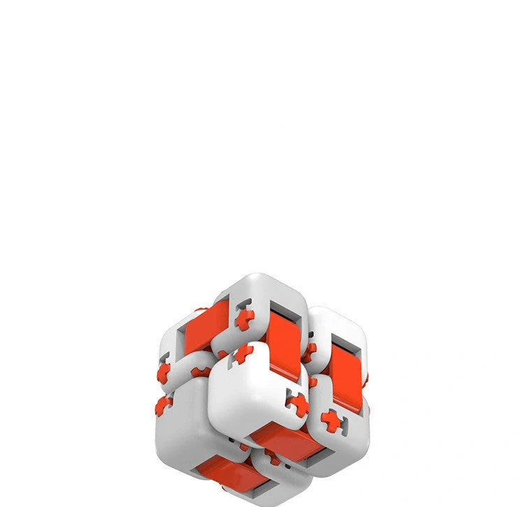 Mitu fidget building block puzzle in white, grey, and orange for stress relief and creative play