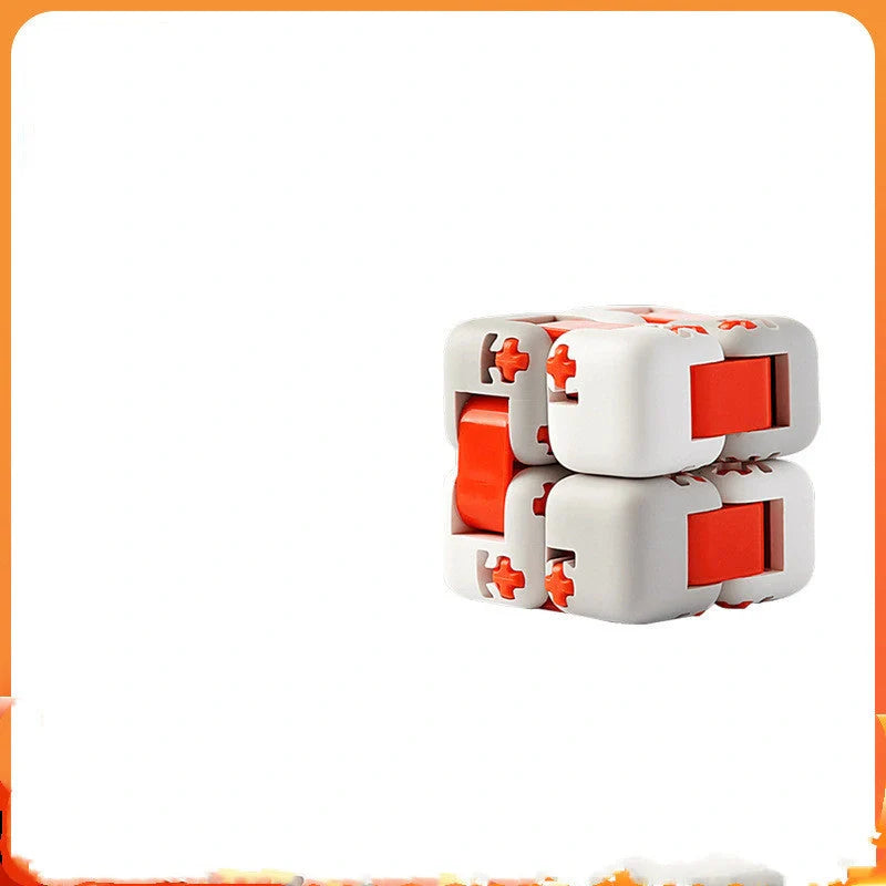 Mitu fidget building block puzzle in white, grey, and orange for stress relief and creative play
