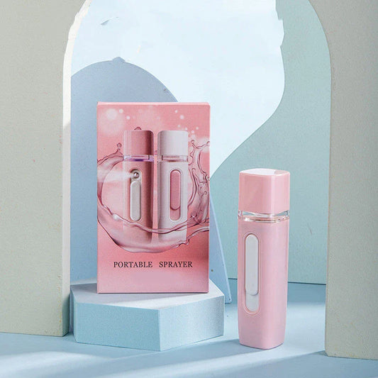 Portable facial mister with 38ml water tank, transforms water into fine mist for hydrating skin on the go