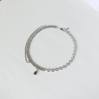 Elegant platinum-plated clavicle chain necklace with a delicate, frosty finish, perfect for adding refined glamour to any outfit.