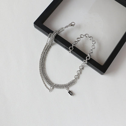 Elegant platinum-plated clavicle chain necklace with a delicate, frosty finish, perfect for adding refined glamour to any outfit.