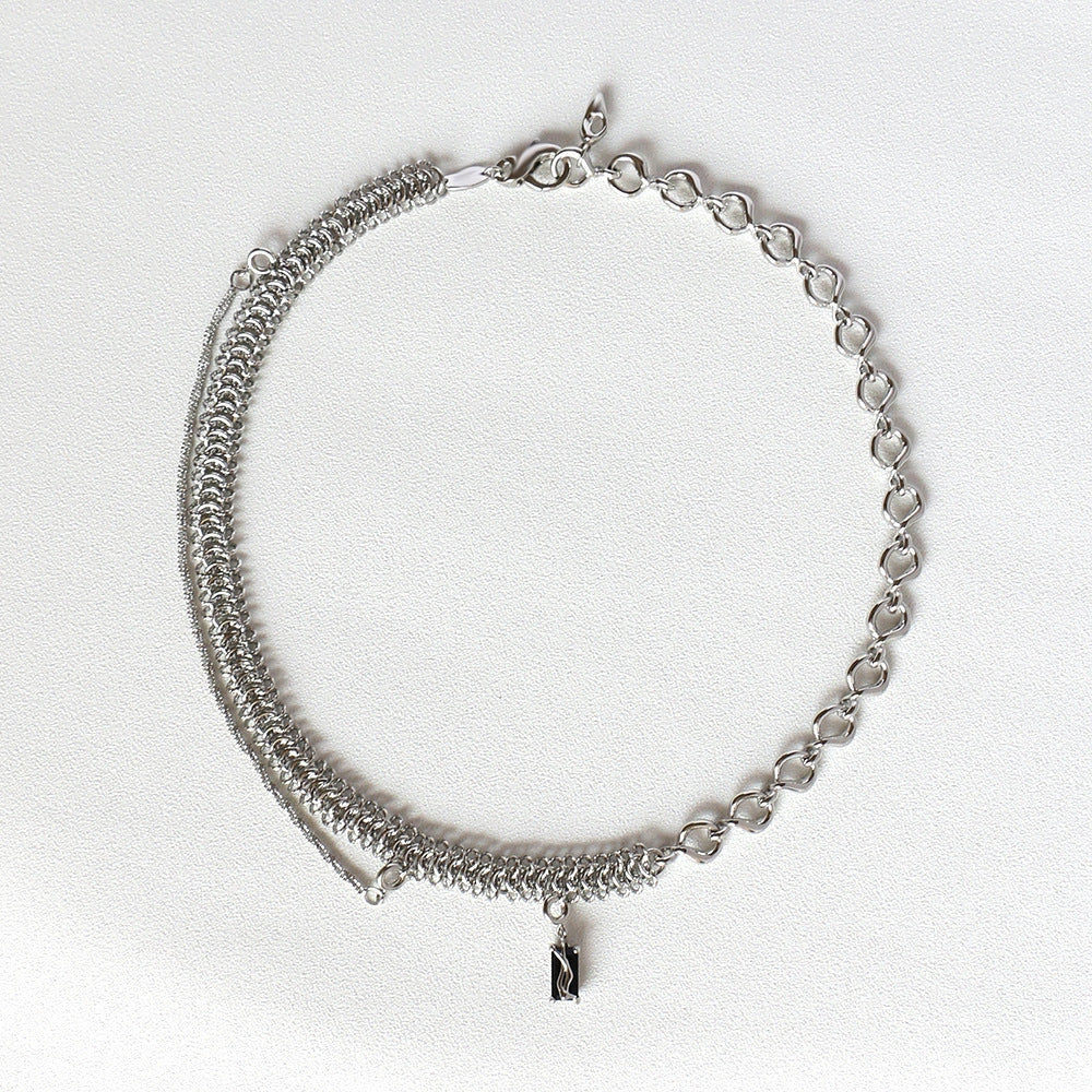 Elegant platinum-plated clavicle chain necklace with a delicate, frosty finish, perfect for adding refined glamour to any outfit.