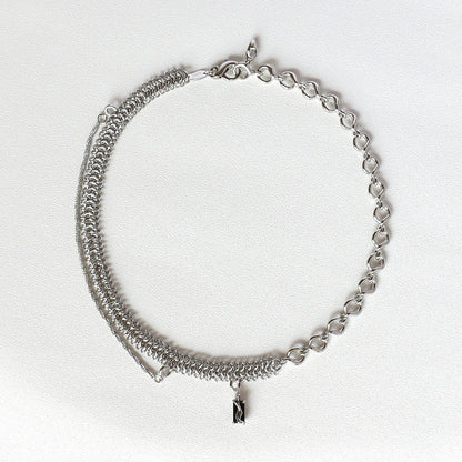 Elegant platinum-plated clavicle chain necklace with a delicate, frosty finish, perfect for adding refined glamour to any outfit.