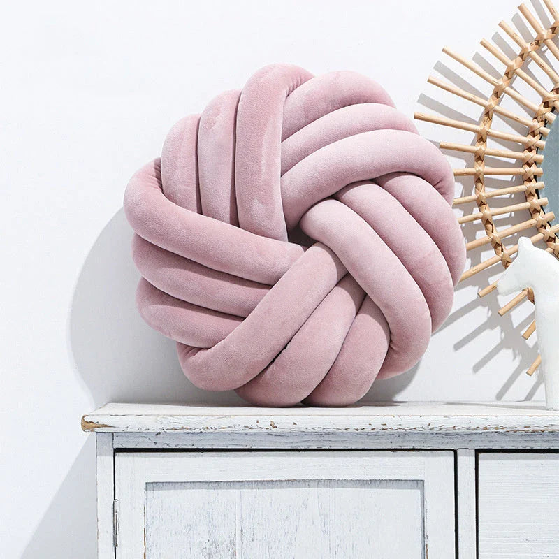 Cozy decorative pillows with knotted ball design in a variety of classic and on-trend color options for living rooms, bedrooms, and offices