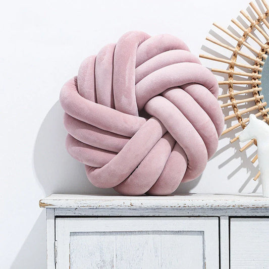 Cozy decorative pillows with knotted ball design in a variety of classic and on-trend color options for living rooms, bedrooms, and offices