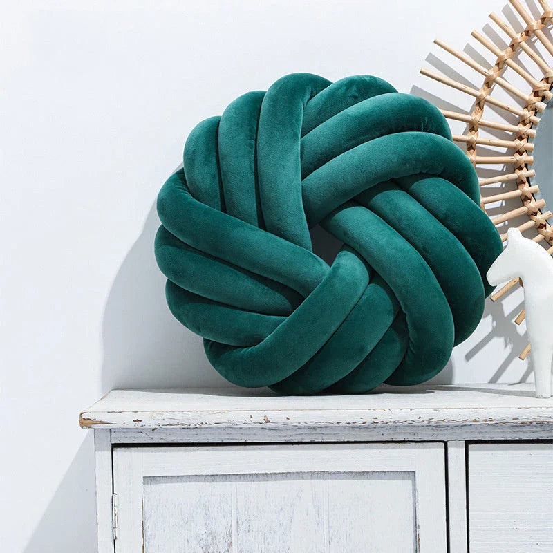Cozy decorative pillows with knotted ball design in a variety of classic and on-trend color options for living rooms, bedrooms, and offices