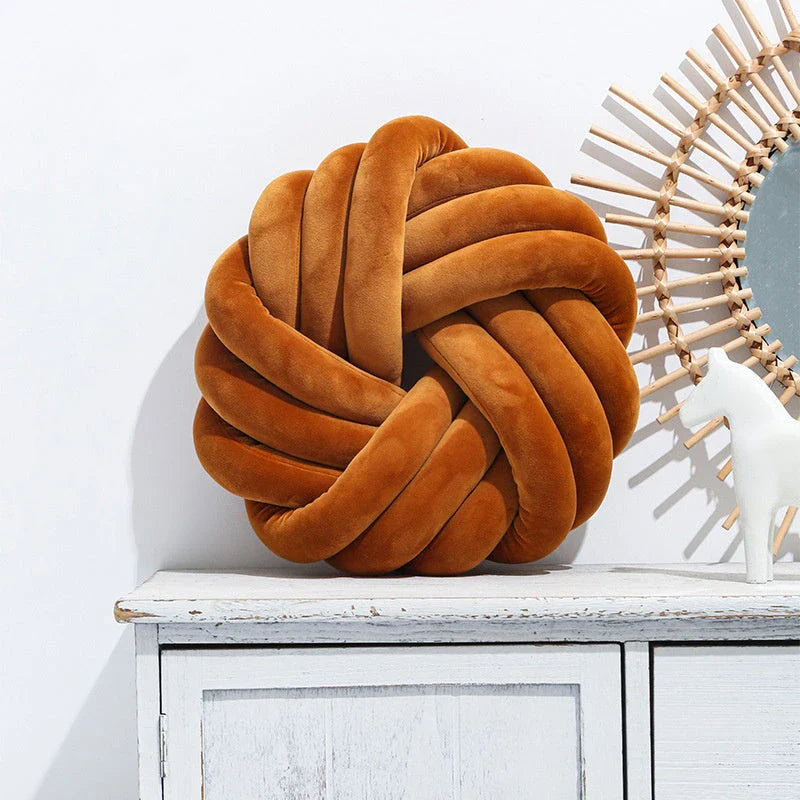 Cozy decorative pillows with knotted ball design in a variety of classic and on-trend color options for living rooms, bedrooms, and offices
