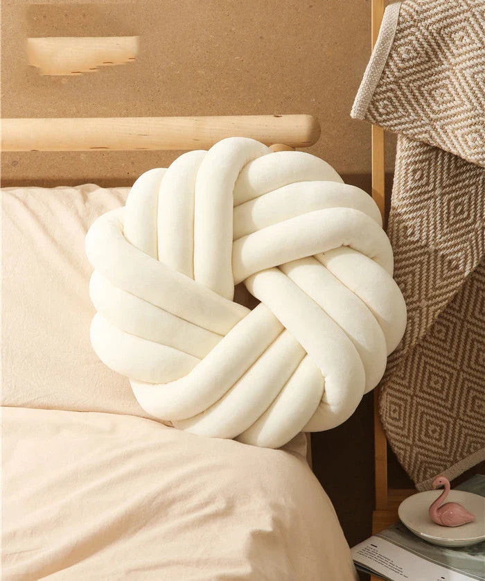 Cozy decorative pillows with knotted ball design in a variety of classic and on-trend color options for living rooms, bedrooms, and offices