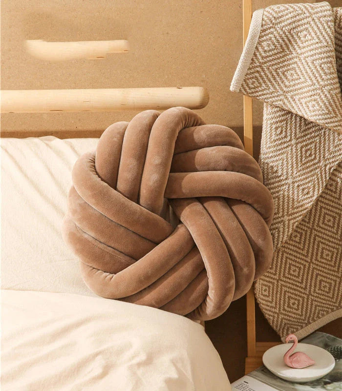 Cozy decorative pillows with knotted ball design in a variety of classic and on-trend color options for living rooms, bedrooms, and offices