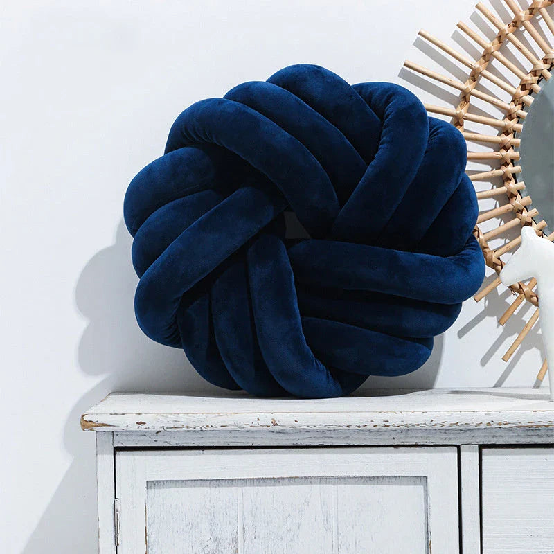 Cozy decorative pillows with knotted ball design in a variety of classic and on-trend color options for living rooms, bedrooms, and offices