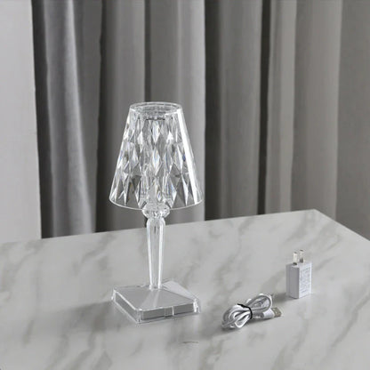Elegant acrylic desk lamp with mesmerising prismatic lighting effects, perfect for enhancing the ambiance in any room.