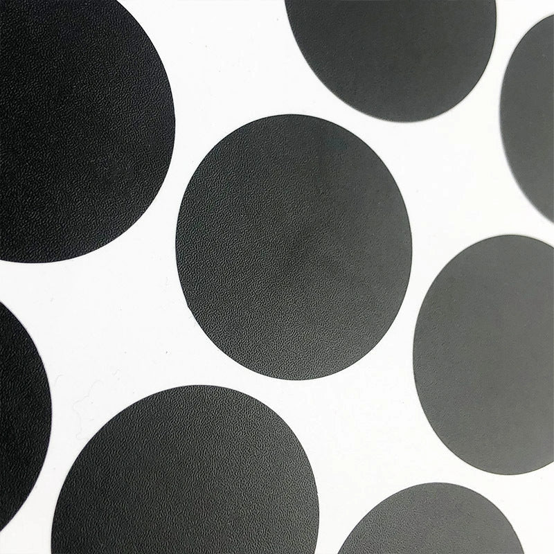 Circular PVC blackboard sticker labels on a jar, showing reusable and erasable features
