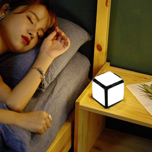 Square LED bedside lamp with folding design and adjustable brightness settings