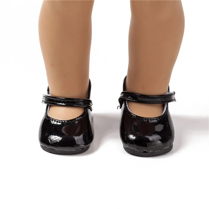 Stylish leather dolls' shoes in various colours, designed to perfectly complement American Girl dolls.