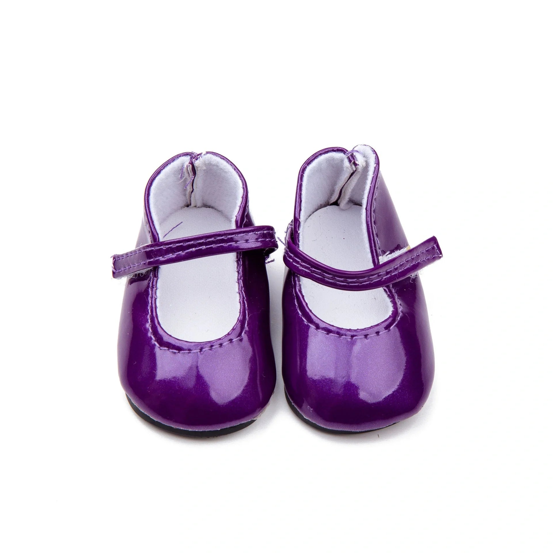 Stylish leather dolls' shoes in various colours, designed to perfectly complement American Girl dolls.