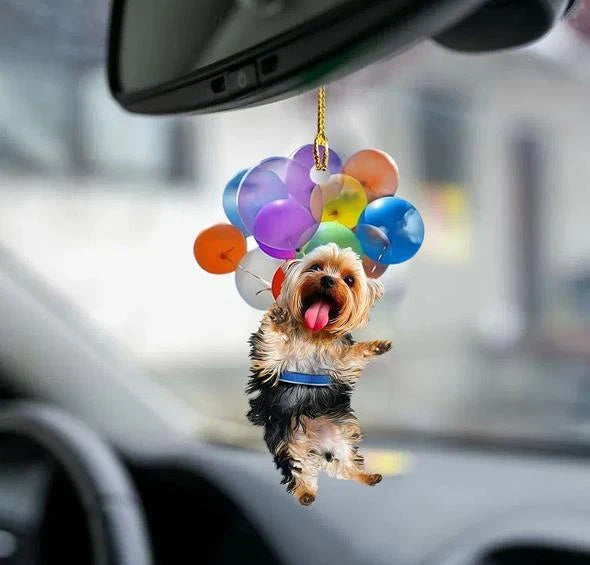 Charming cartoon dog car charm with vibrant balloon parachute design, a delightful automotive accessory for pet lovers