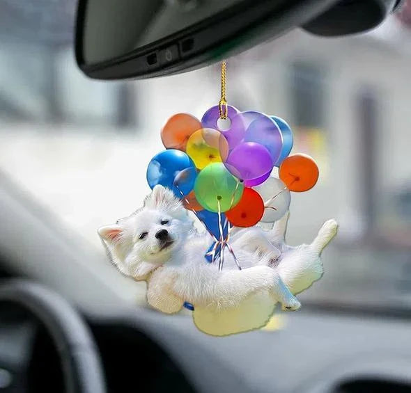 Charming cartoon dog car charm with vibrant balloon parachute design, a delightful automotive accessory for pet lovers