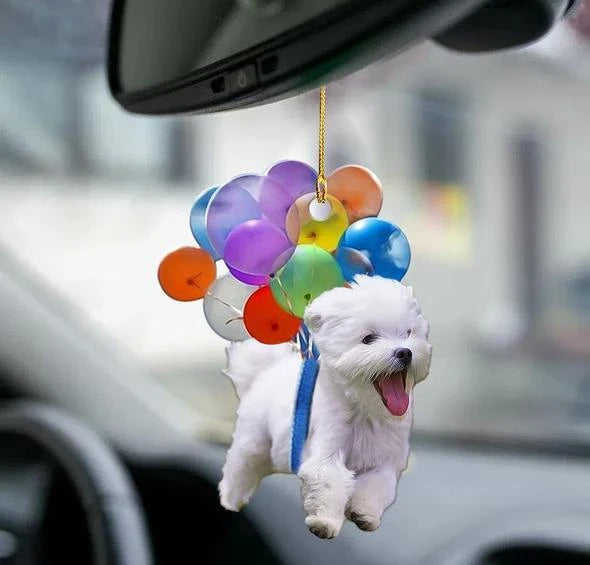Charming cartoon dog car charm with vibrant balloon parachute design, a delightful automotive accessory for pet lovers
