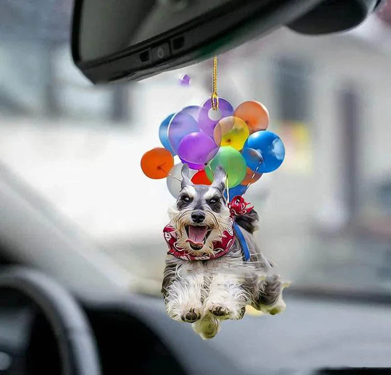 Charming cartoon dog car charm with vibrant balloon parachute design, a delightful automotive accessory for pet lovers
