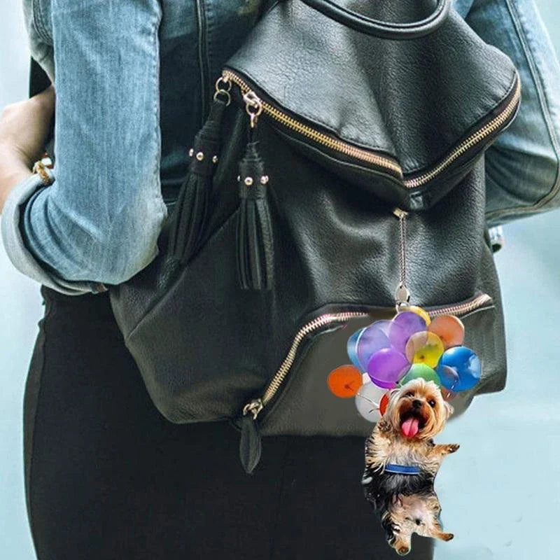Charming cartoon dog car charm with vibrant balloon parachute design, a delightful automotive accessory for pet lovers