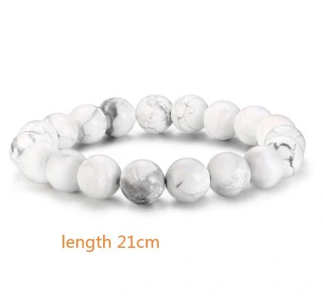 Natural Black Lava Rock and White Stone Stretch Bracelet showcasing unique natural stone beads