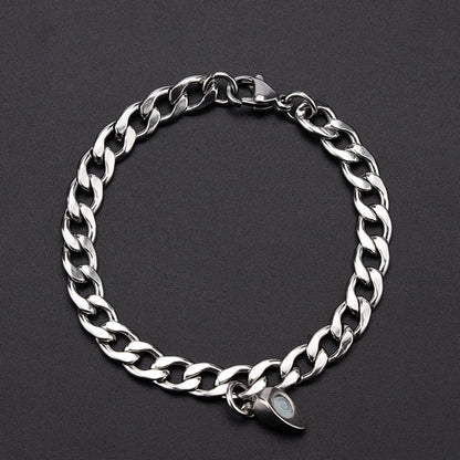 Elegant titanium steel couple bracelets with heart design, perfect for love gifts.