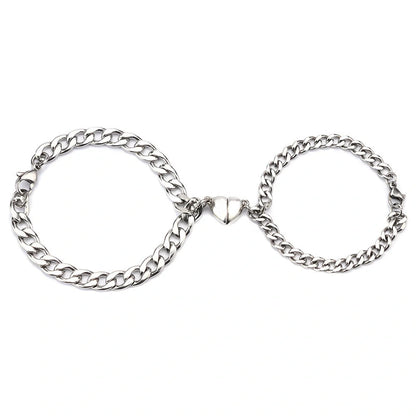 Elegant titanium steel couple bracelets with heart design, perfect for love gifts.