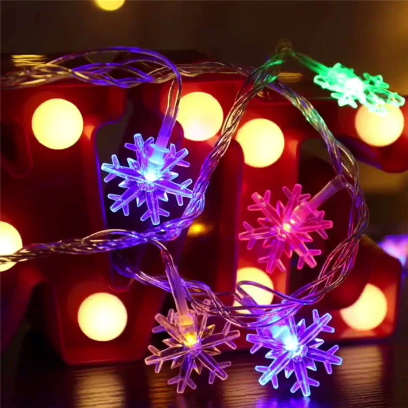 Snowflake string light garlands for Christmas and winter decor in various colours and lengths