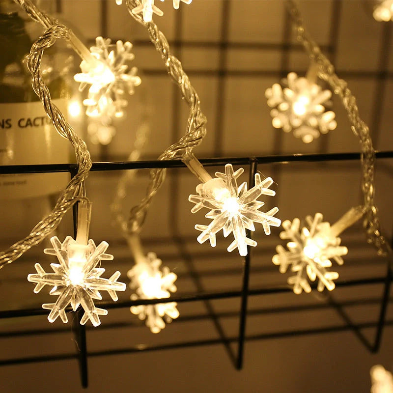 Snowflake string light garlands for Christmas and winter decor in various colours and lengths