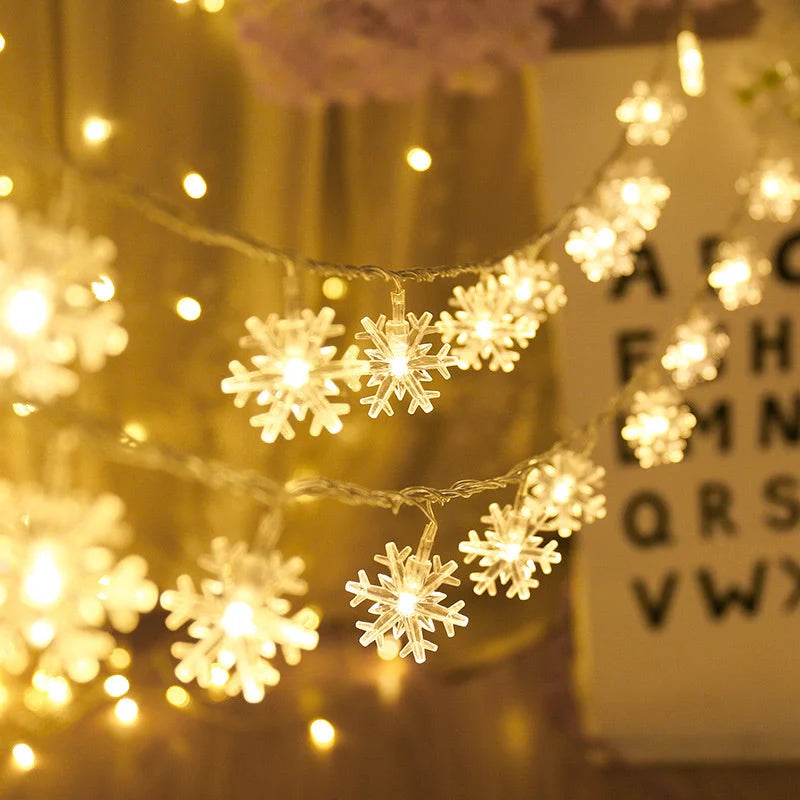 Snowflake string light garlands for Christmas and winter decor in various colours and lengths