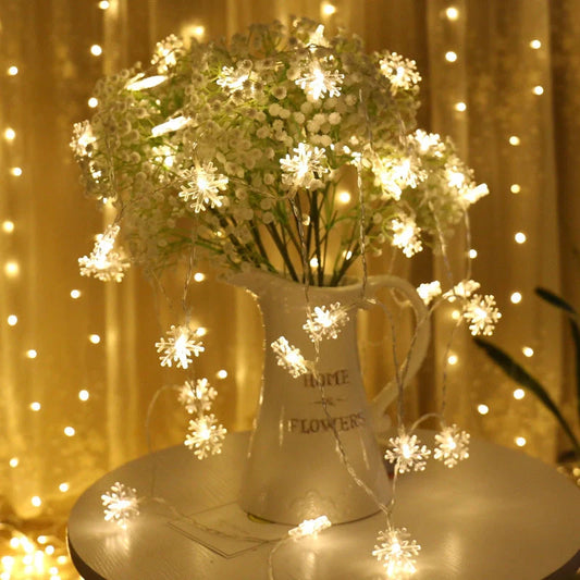 Snowflake string light garlands for Christmas and winter decor in various colours and lengths