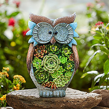 A charming solar-powered outdoor owl light made of high-quality resin, providing warm illumination for your yard or garden