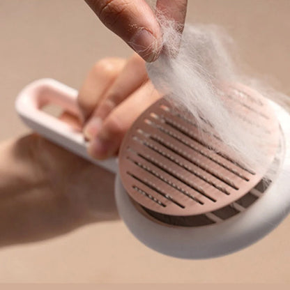 Automatic pet hair remover brush in pink, blue, and green options