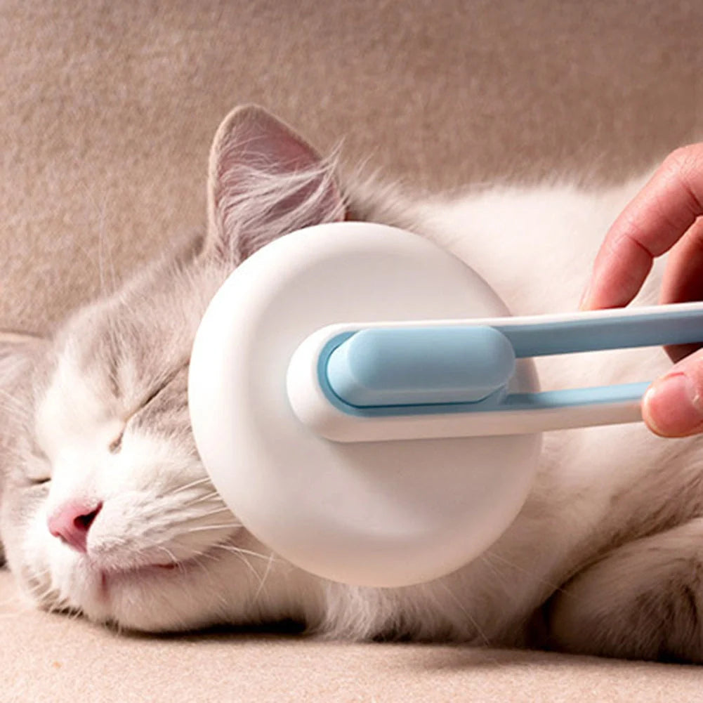Automatic pet hair remover brush in pink, blue, and green options
