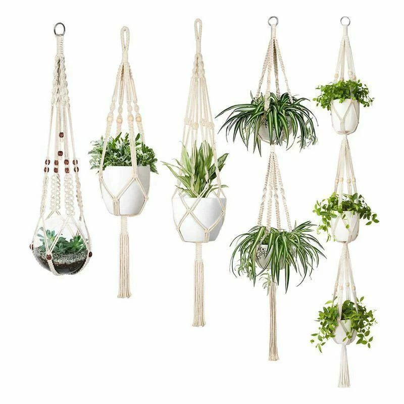 Handmade bohemian macrame hanging plant baskets in a set of four, perfect for home decor.