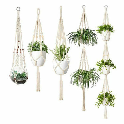 Handmade bohemian macrame hanging plant baskets in a set of four, perfect for home decor.