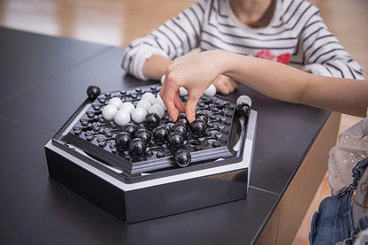 Abalone strategy game with marble board and pieces for family and kids to play