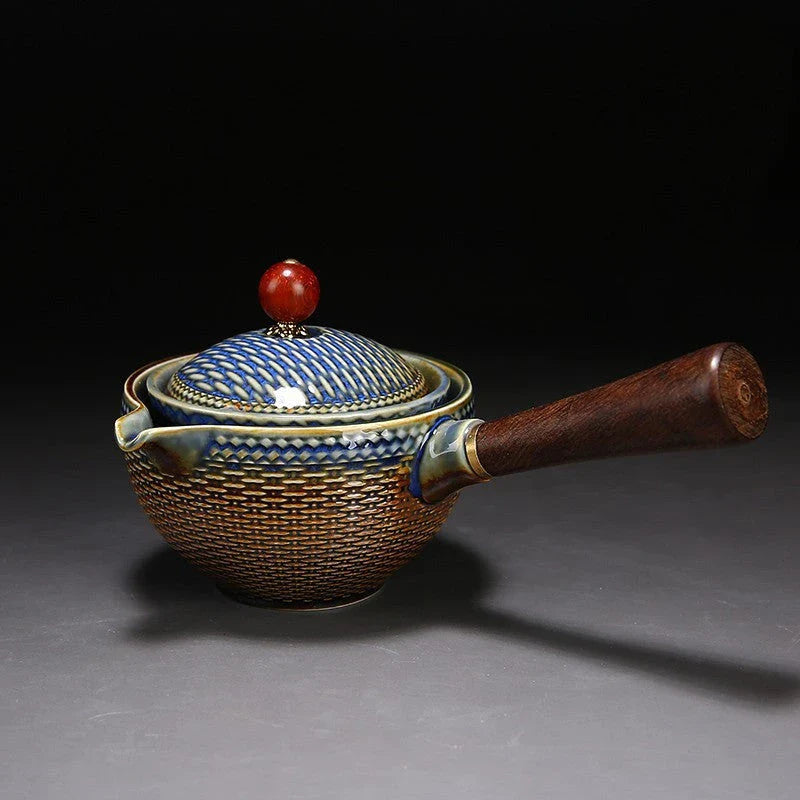 Handcrafted ceramic teapot with wooden handle, designed for brewing traditional Oolong tea with enhanced flavour and aroma
