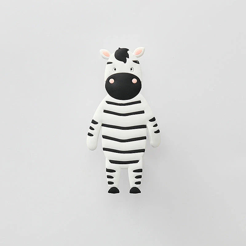 Assorted animal-shaped wall hooks in various colours, including bear, zebra, and cow designs, displayed on a white background