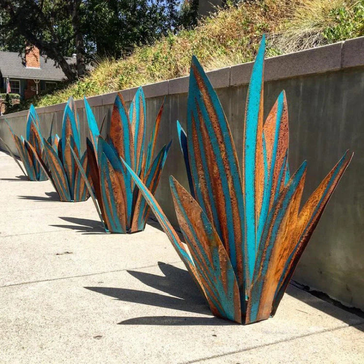 Handmade tequila agave metal sculpture in rustic finish with blue highlights