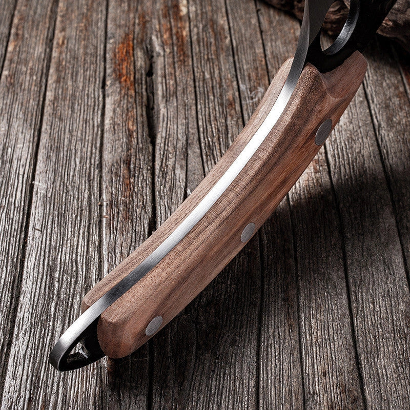 Antique small scimitar knife with stainless steel blade and walnut handle