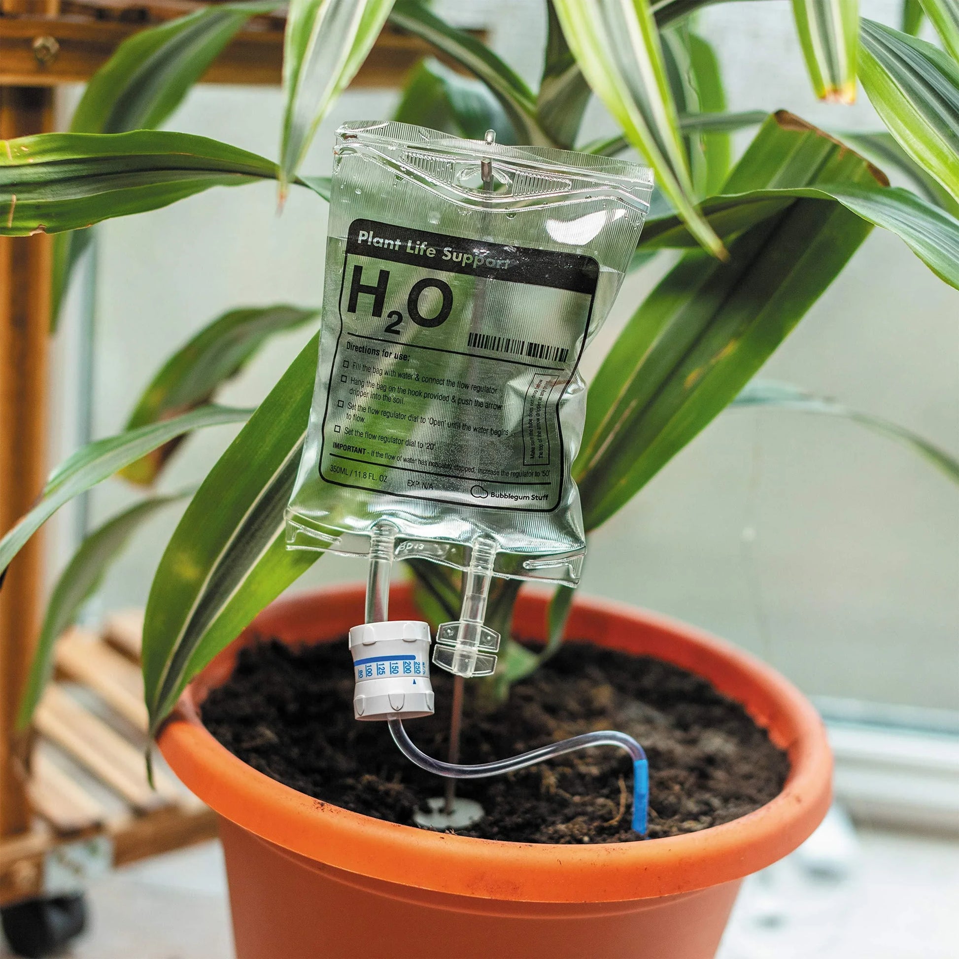Premium drip-feed plant watering bag in transparent color, designed for indoor gardening and travel