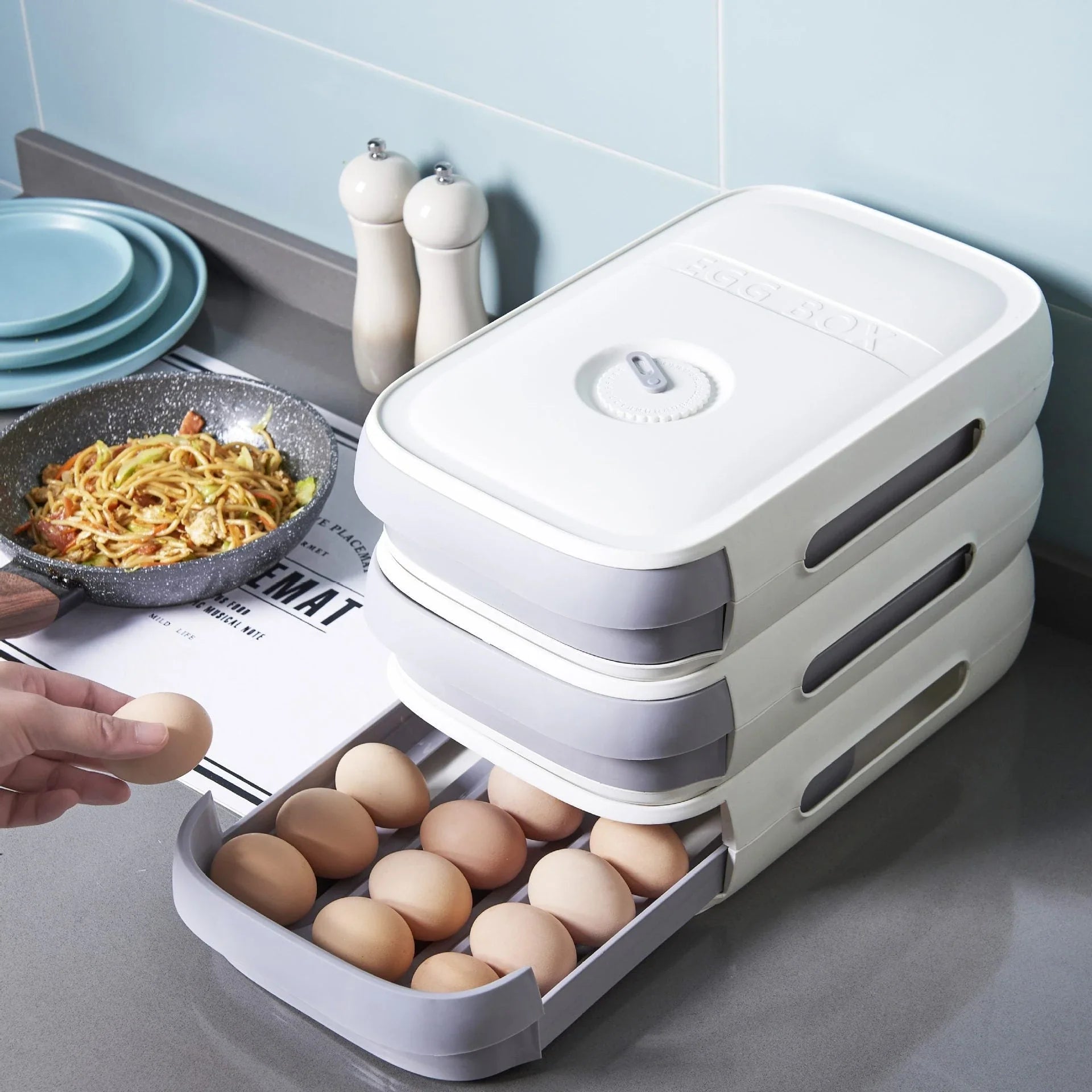 Premium refrigerator egg holder with stackable drawers and breathable mesh compartments for efficient kitchen storage