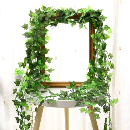 Elegant silk hanging foliage garland with lifelike green leaves for home, wedding, and garden decor