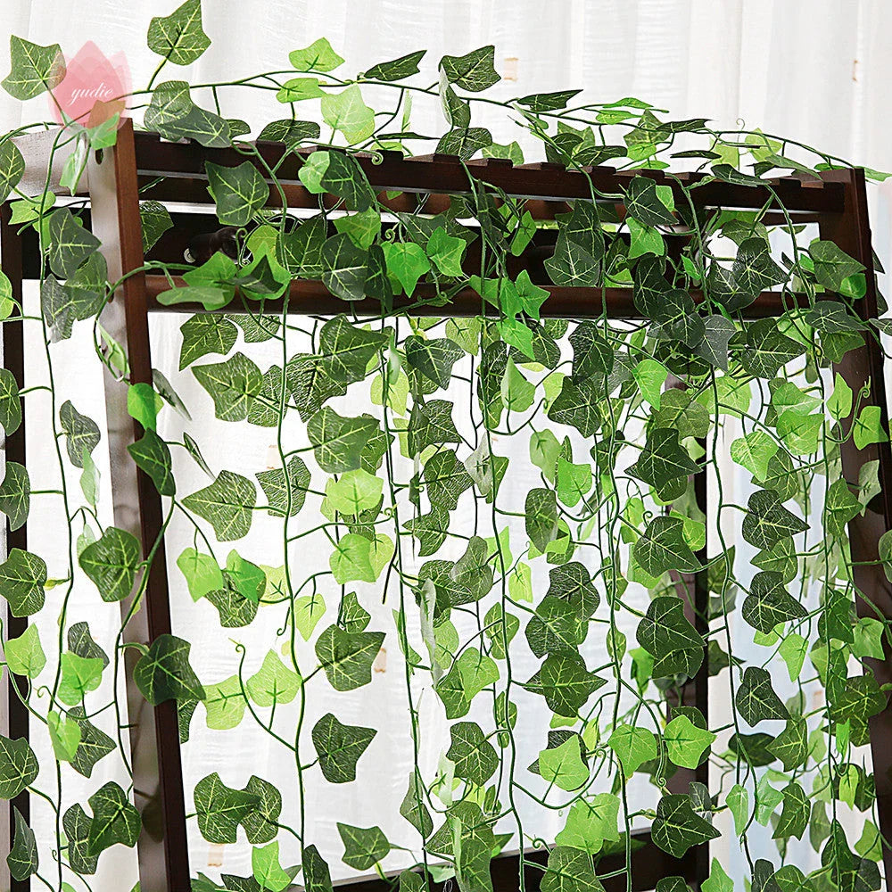 Elegant silk hanging foliage garland with lifelike green leaves for home, wedding, and garden decor