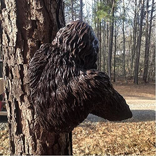 Bigfoot 3D Resin Tree Decoration peeking around a tree, perfect for gardens and shelves