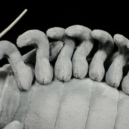 Realistic plush toy of the giant isopod, a deep-sea crustacean with a unique segmented body and armoured plates